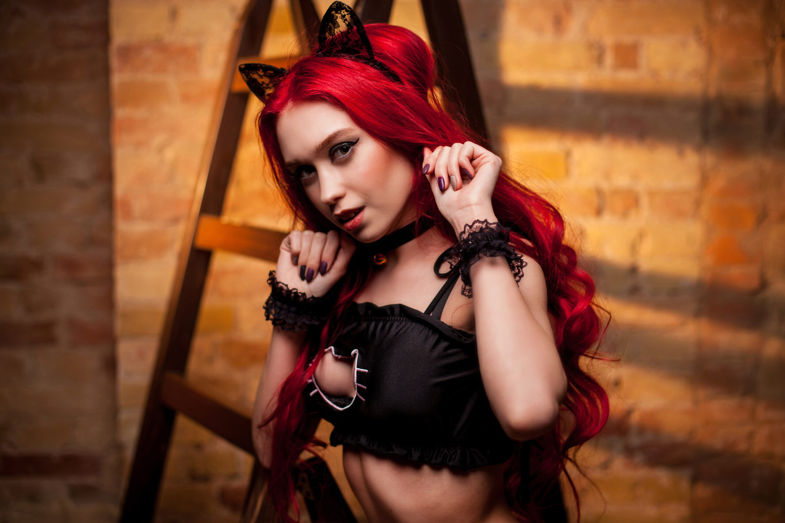 marvel erotica woman in red wig doing black cat cosplay